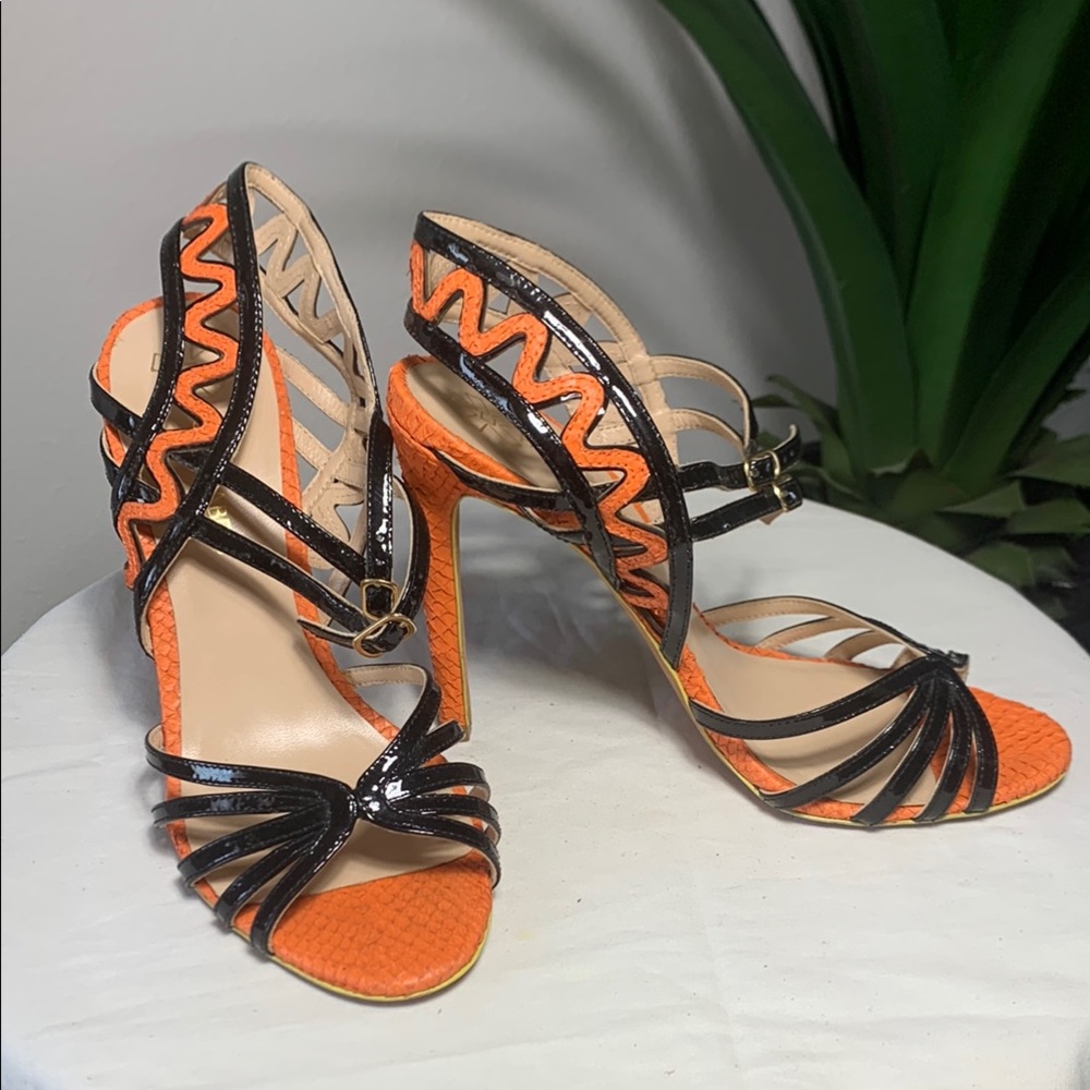 Chic Orange and Black Heels with Intricate Design